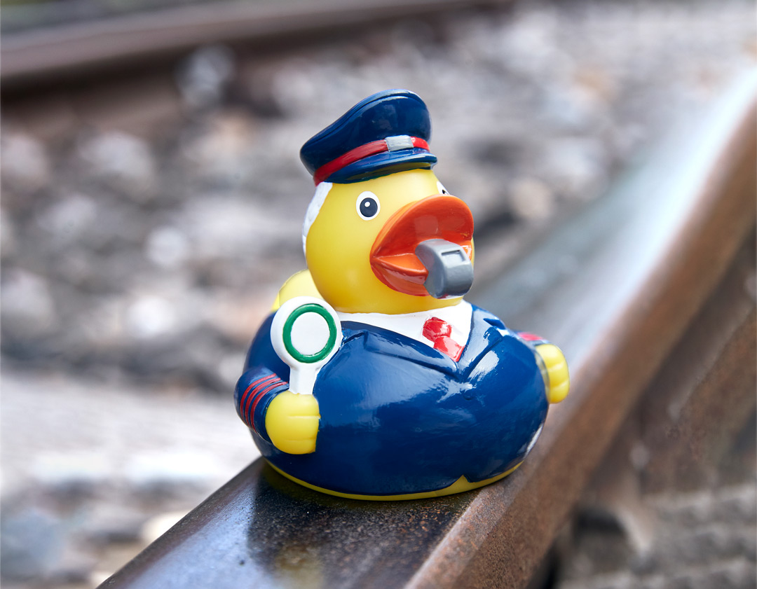 Squeaky duck train attendant